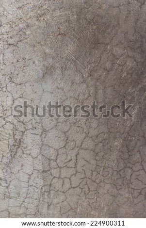 Texture of the gray polished concrete wall with scratches and uneven color for background