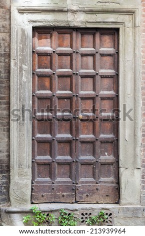 Old, wooden Tuscan door