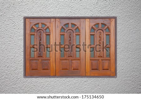 wood window on gray wall
