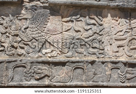 Bas-relief carving of eagle, chieftain and snake, pre-Columbian Maya civilization, Chichen Itza, Yucatan, Mexico. UNESCO world heritage site