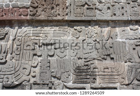 Bas-relief carving with of a american indian chieftain, pre-Columbian Maya civilization, Temple of the Feathered Serpent in Xochicalco, Mexico. UNESCO world heritage site