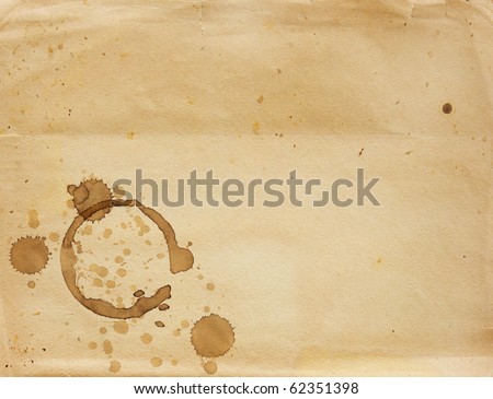 Texture - a sheet of the old paper with drops of coffee