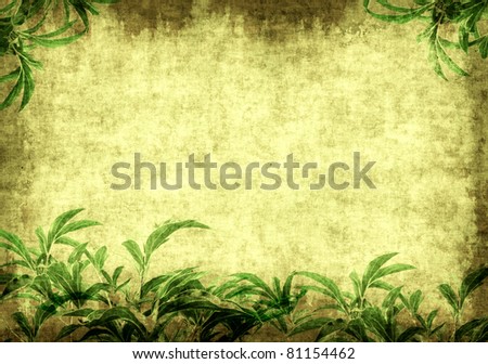 Grunge background - a sheet of the old paper with green leaves