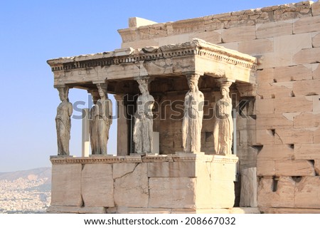 Sunrise lights the side porch of Caryatides in Erechtheum from Athenian Acropolis, Greece