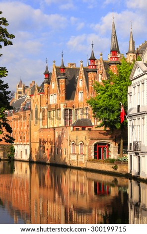 Historic medieval buildings along a canal in Bruges Belgium Historic medieval buildings along a canal in Bruges Belgium