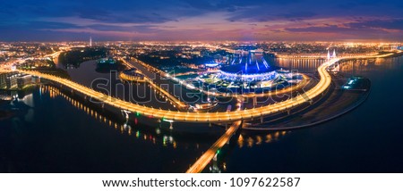Streets of St. Petersburg from a height. Beautiful aerial view from the bird\'s eye view of the Gulf of Finland, Saint-Petersburg, Russia, with a stadium.  Krestovsky Island.
