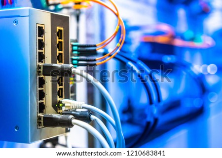 Electrical Circuits.  The electric wire behind the control board with lighting effect,Industrial Electrical Concept. Wiring PLC Control panel with wires industrial factory