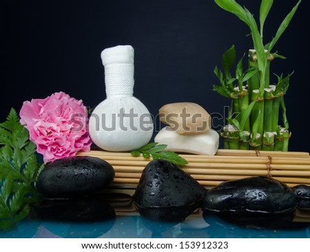 Spa massage,organic soap bars,spa herbal balls, flower on bamboo and zen stone.