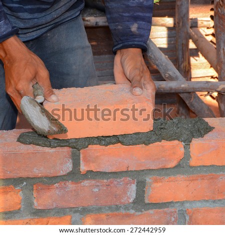 Mason brick walls were formed by using the work placement is patterned brick alternating rows up from the floor up.