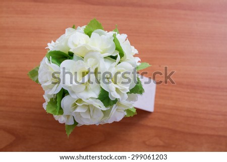 Close up of Fake White Flower On the table