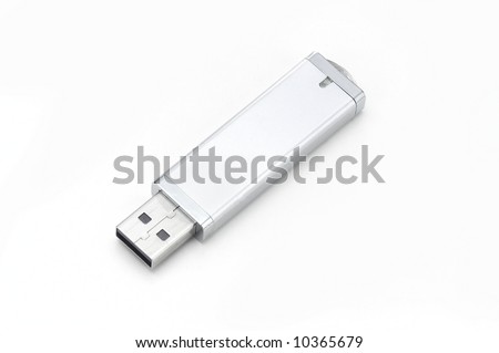silver flash drive down on white