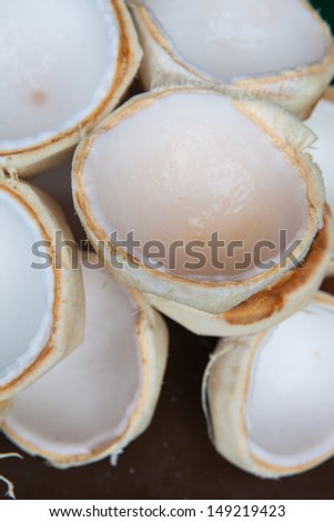 Coconut shell and see the white flesh to eat