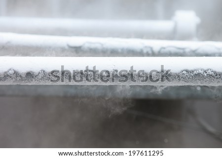 Cold metal pipe smoking from transferring liquid nitrogen