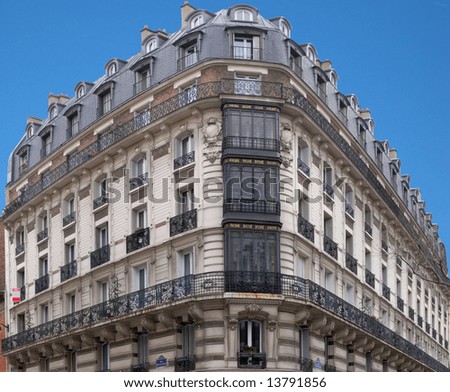 Architecture : typical Parisian building in corner of Hector Malot Street and Daumesnil Avenue. Panoramic assemblage.