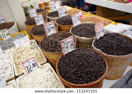 Variety of coffee beans for sale in local market