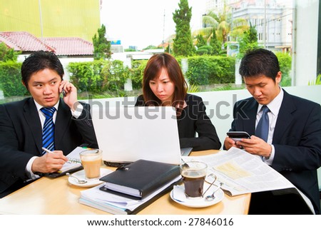 Group of businesspeople busy by themselves