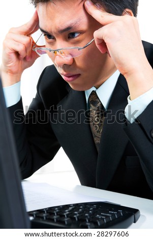 http://image.shutterstock.com/display_pic_with_logo/169600/169600,1239425991,10/stock-photo-side-view-of-a-young-businessman-thinking-very-hard-in-front-of-his-computer-in-office-28297606.jpg