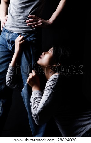 stock photo : Portrait to show man domination over woman.