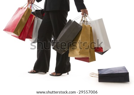 A zoom version of the drop bag where the woman is walking while carrying a lot of shopping bags without realizing it.
