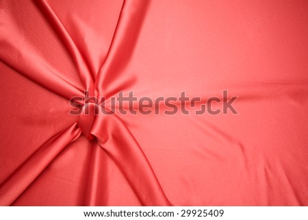 The red satin is arranged in simple pattern, can be use for background, card design, etc.