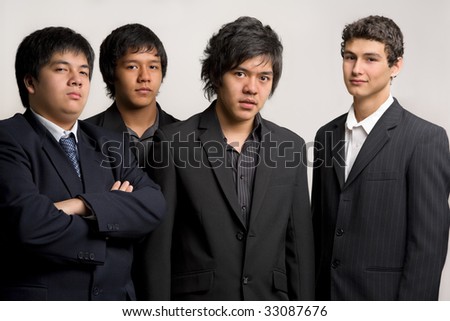 A group of young men in black suit