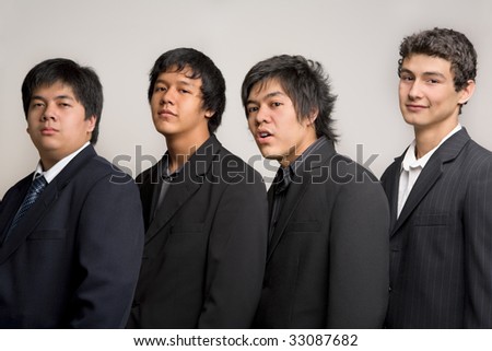A group of young men in black suit