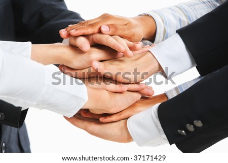 People put their hand on top of each other