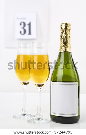 Champagne on new year eve with calendar on background