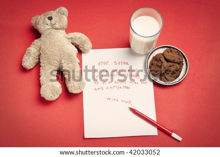Christmas wish letter from lonely child  and teddy bear, with milk and cookies for Santa
