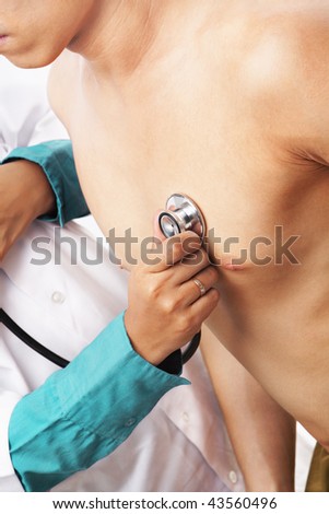 Doctor checking patient heart beat with stethoscope