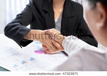 Agreement between two businesswomen or with the client in office