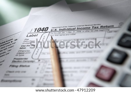 1040 Tax form in blank state, with other accessories.