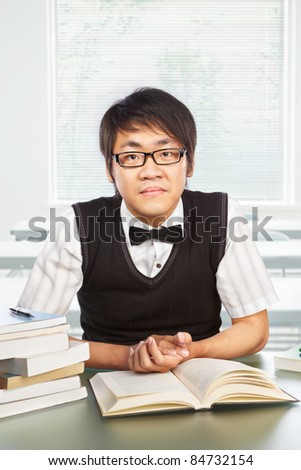 Chinese collage male student pose to the camera