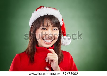 Asian lady with red Christmas outfit expressing her happiness