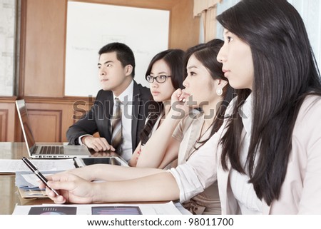 Group of Asian business people listening in a meeting season