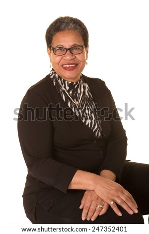 Attractive older black woman isolated on white