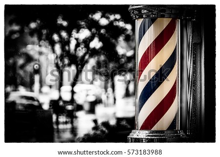 Rain collecting on the barber shop pole at Island Barbers in Coronado, California.