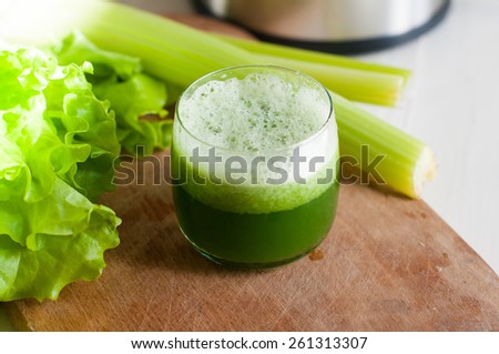 Freshly squeezed juice of fresh cucumber and celery, detox diet, vegan food