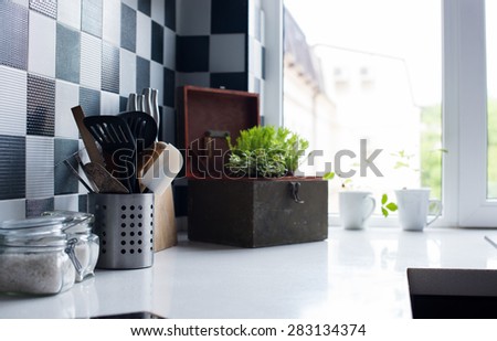 Kitchen utensils, decor and kitchenware in the modern kitchen interior close-up