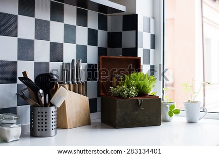 Kitchen utensils, decor and kitchenware in the modern kitchen interior close-up