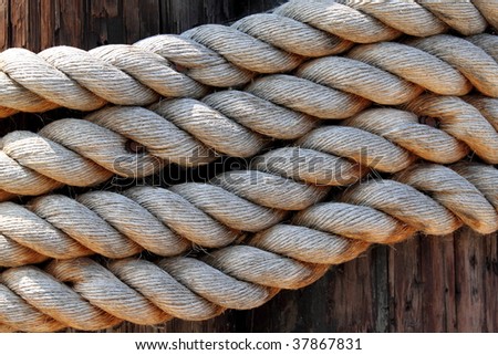 old rope to tied a sail boat to the pier