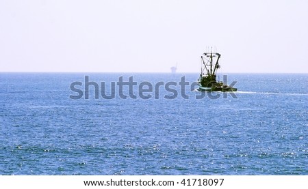 Fishing Boat out on the ocean on a clear day