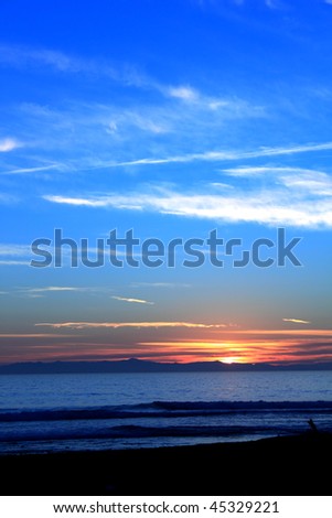 Beautiful sunset over the ocen at Ventura beach with channel islands in background