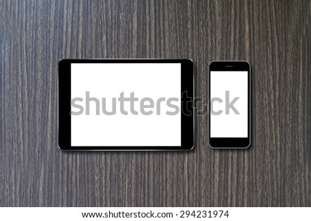 Tablet and Smartphone on wood background with copy space and text space,Responsive web design
