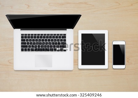Laptop tablet and smartphone on wood table background with text space and copy space, Responsive Web Design