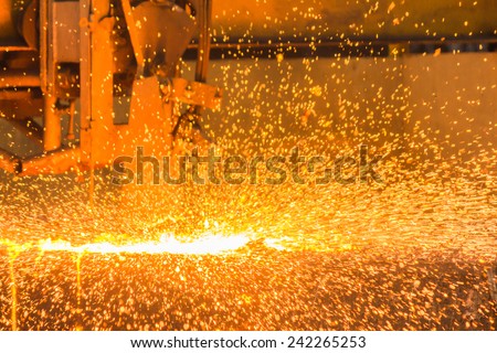 Industry steel, Tending the fire spread from the open shell slab.