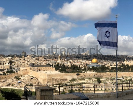 Israel flag above the old city of Jerusalem Israel