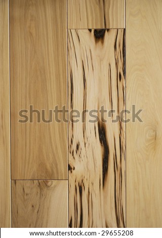Close up of character grade hickory hardwood flooring planks.