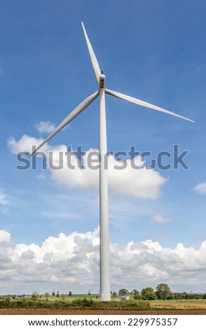 The white and big wind turbine stands at wind farm Thailand, for renewable electric energy production.