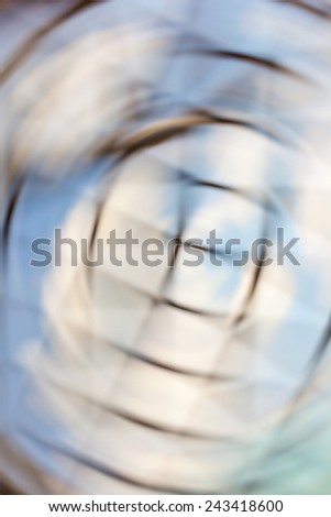 Blurred image of transparent ceiling and blue sky background in the Airport.